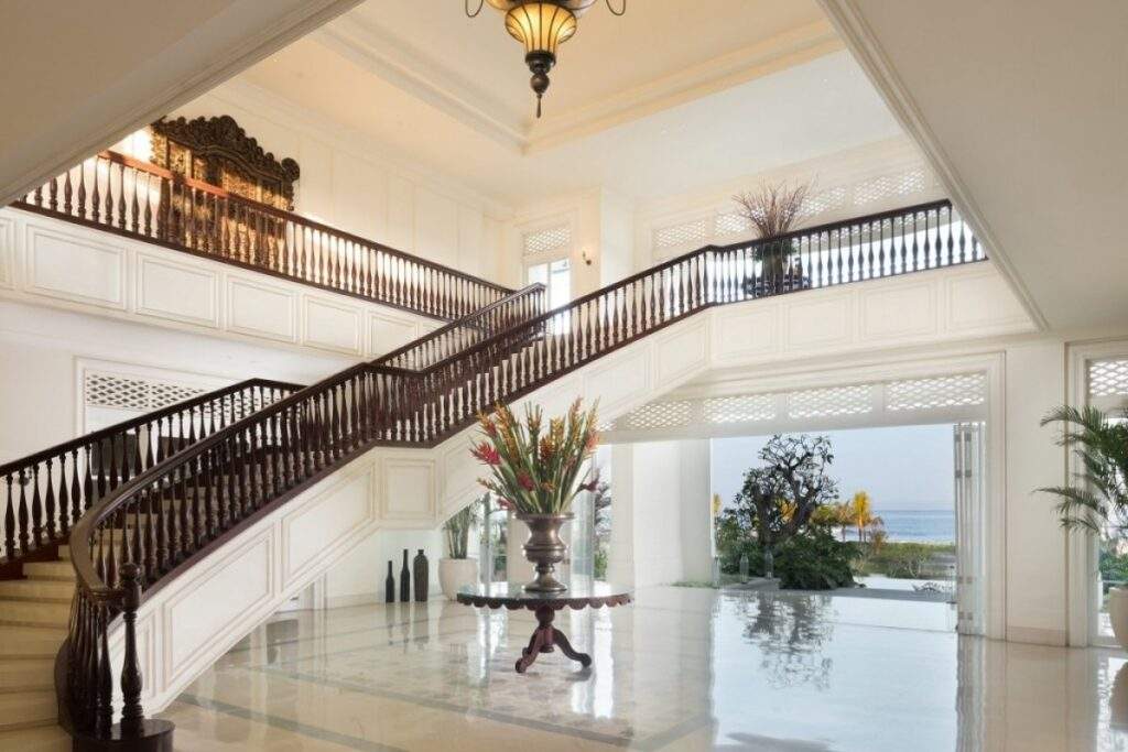 grand staircase with opening to outside