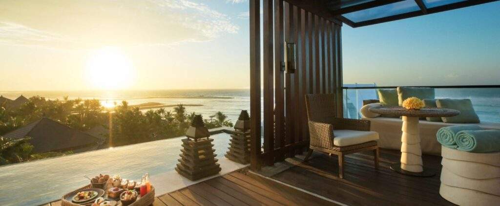 resort deck surrounded by pool