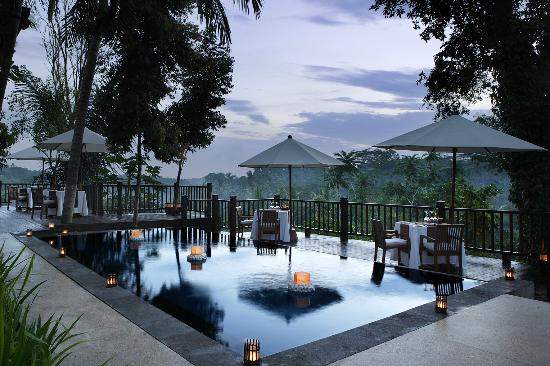 square pool with candles along the outside