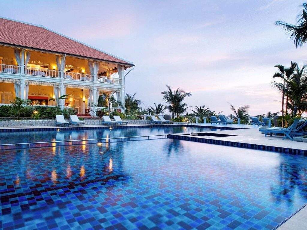 large resort pool in front of building