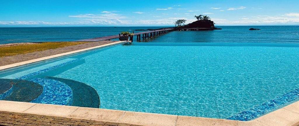 infinity pool in front of ocean