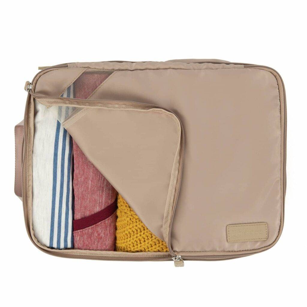 towels rolled into packing cube