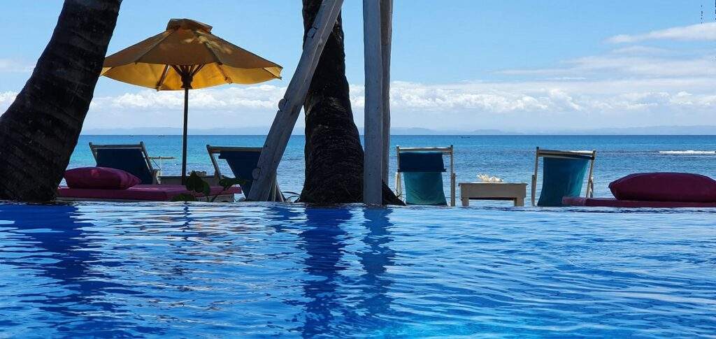 infinity pool in front of ocean