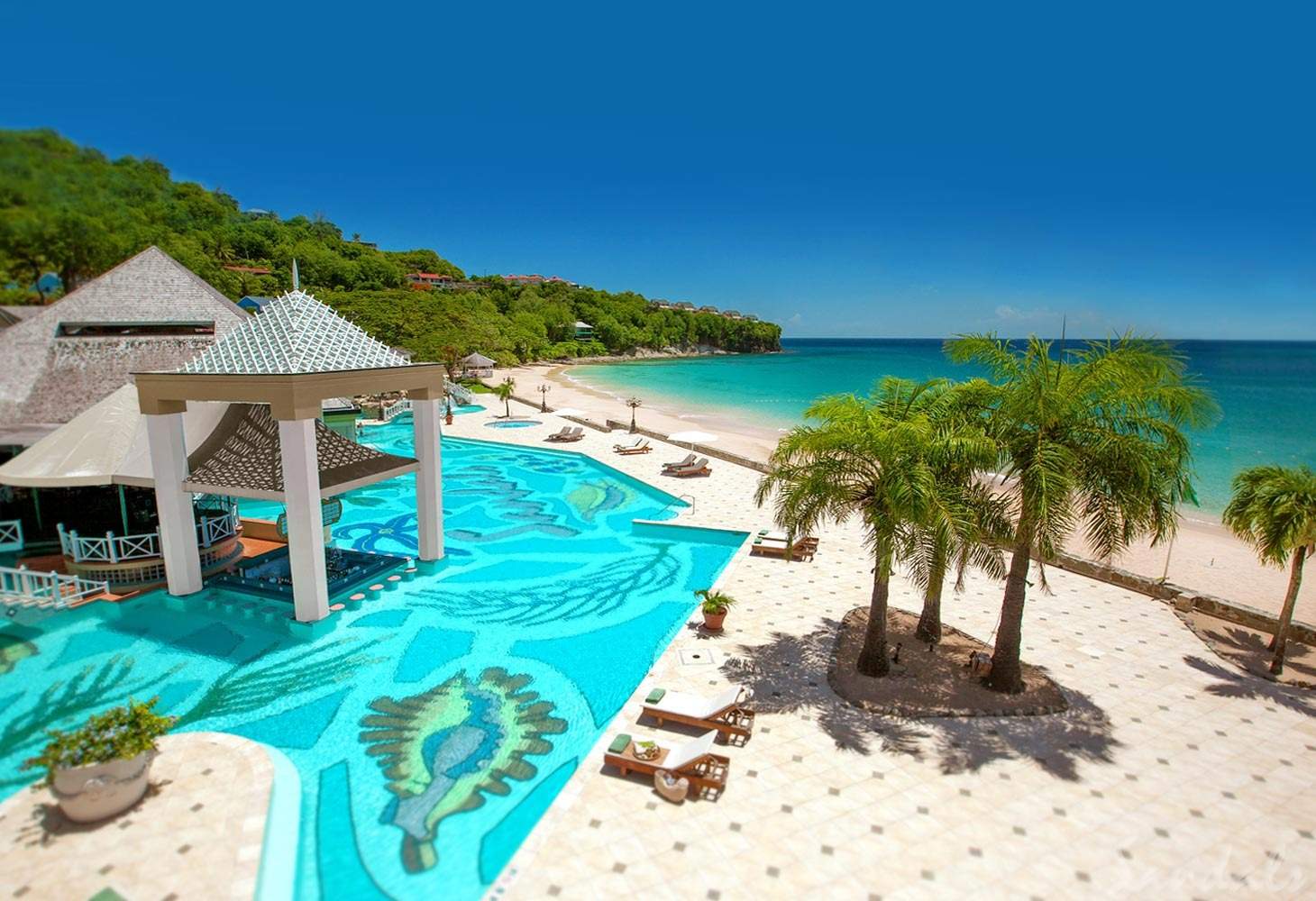 resort pool next to ocean