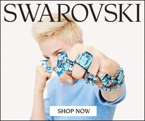 woman with rings on every finger