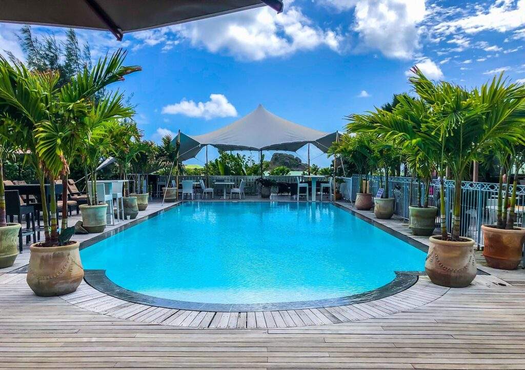 large resort pool with covered bar