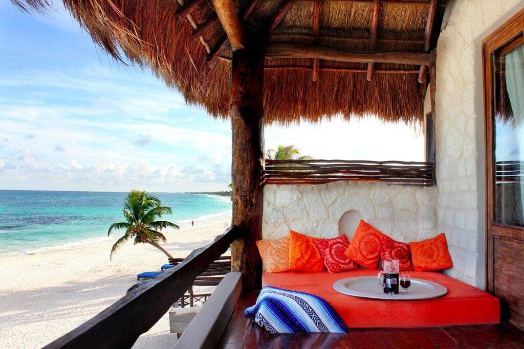 couch under covering on beach