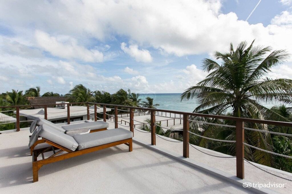 two lounge chairs on beach resort patio