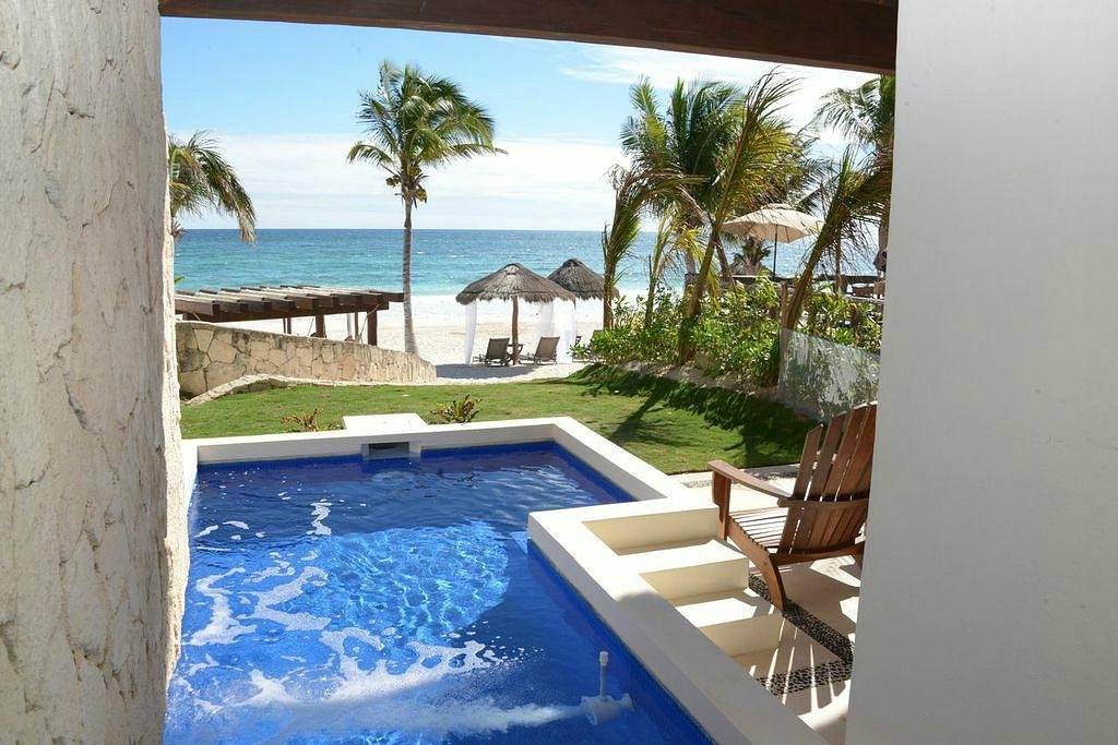 private resort pool facing beach