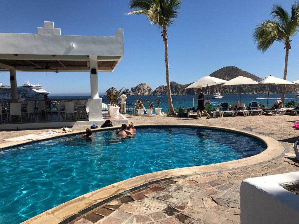 resort swimming pool with people in it