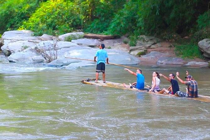 people on raft on water