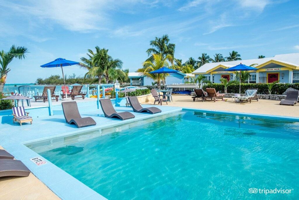 square resort pool surrounded by lounge chairs