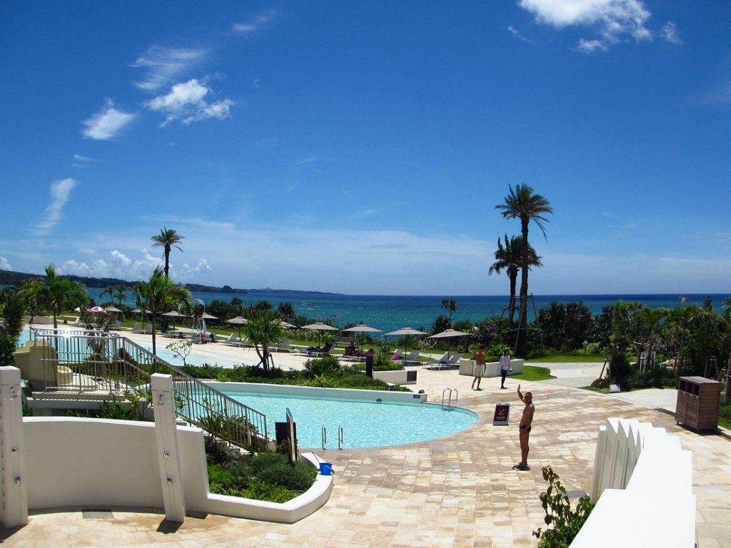 resort pool in front of ocean