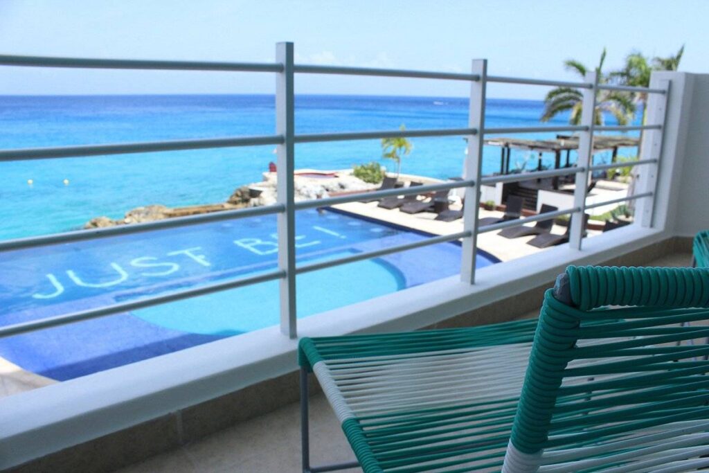patio overlooking pool and ocean
