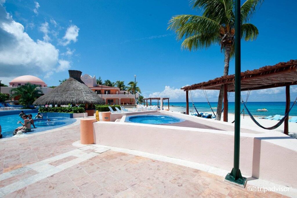 resort at ocean with pool and hot tub