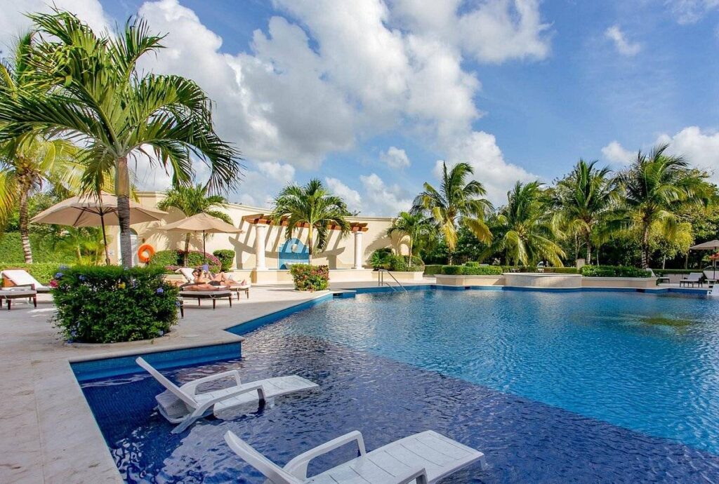 resort pool with trees