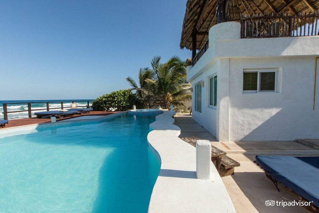 long pool along white sand beach