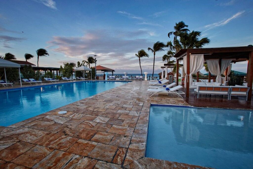 two large pools separated by walkway