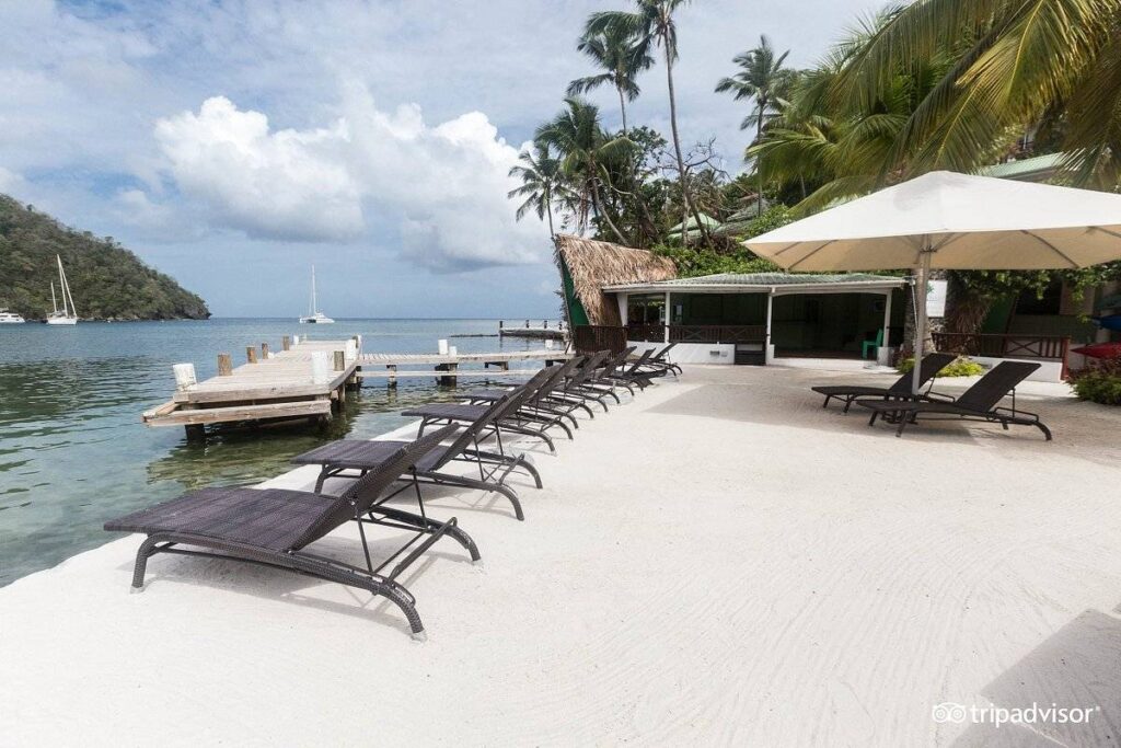 lounge chairs and umbrellas along pool