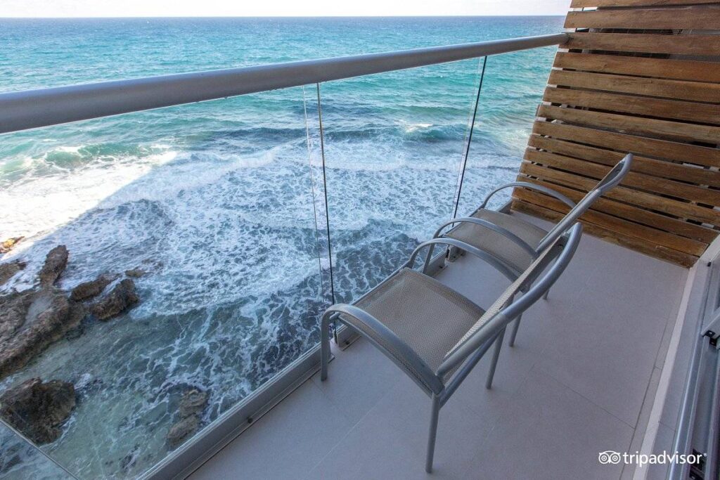 two chair on patio overlooking ocean