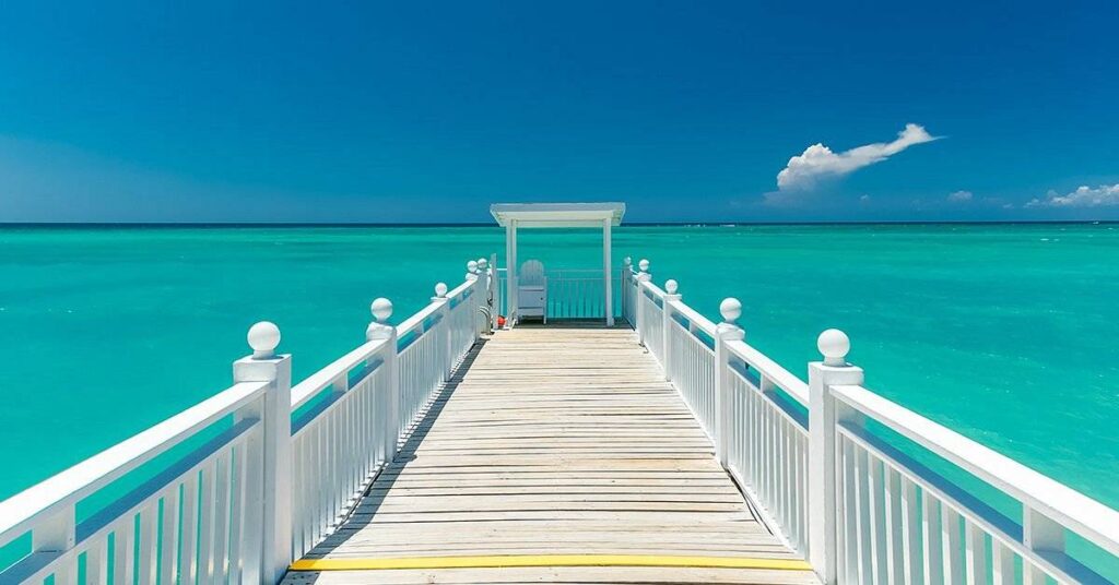 white pier over topical waters