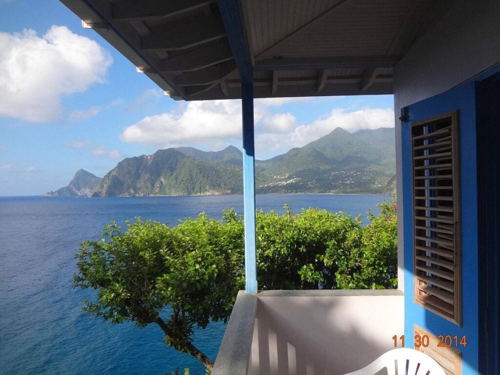 small patio at ocean with mountains in background
