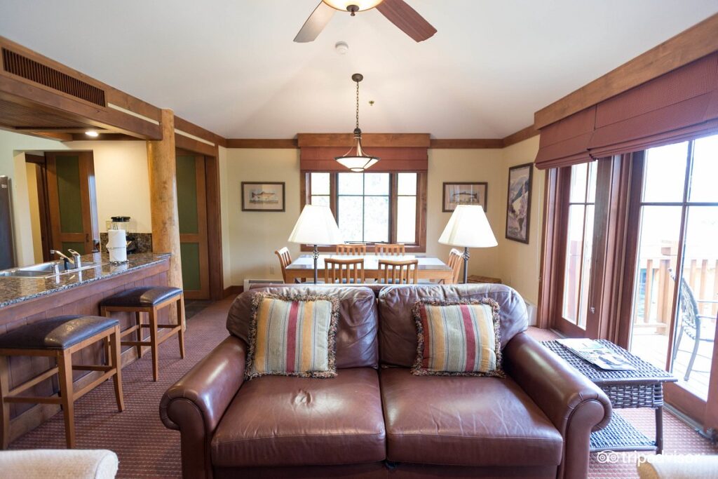 large resort living area with brown leather furniture