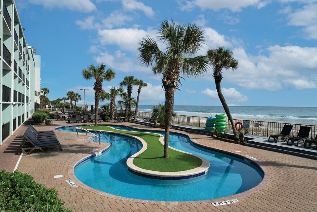 Compass Cove Oceanfront Resort curved pool