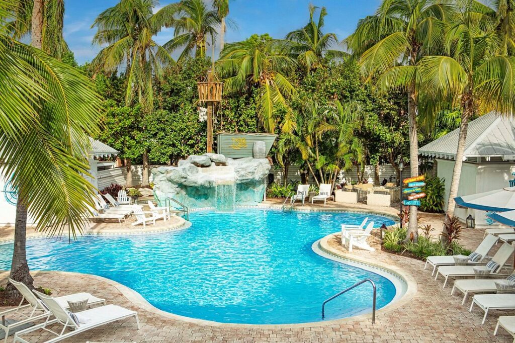 Margaritaville Key West Resort & Marina irregular shaped pool with many palm trees