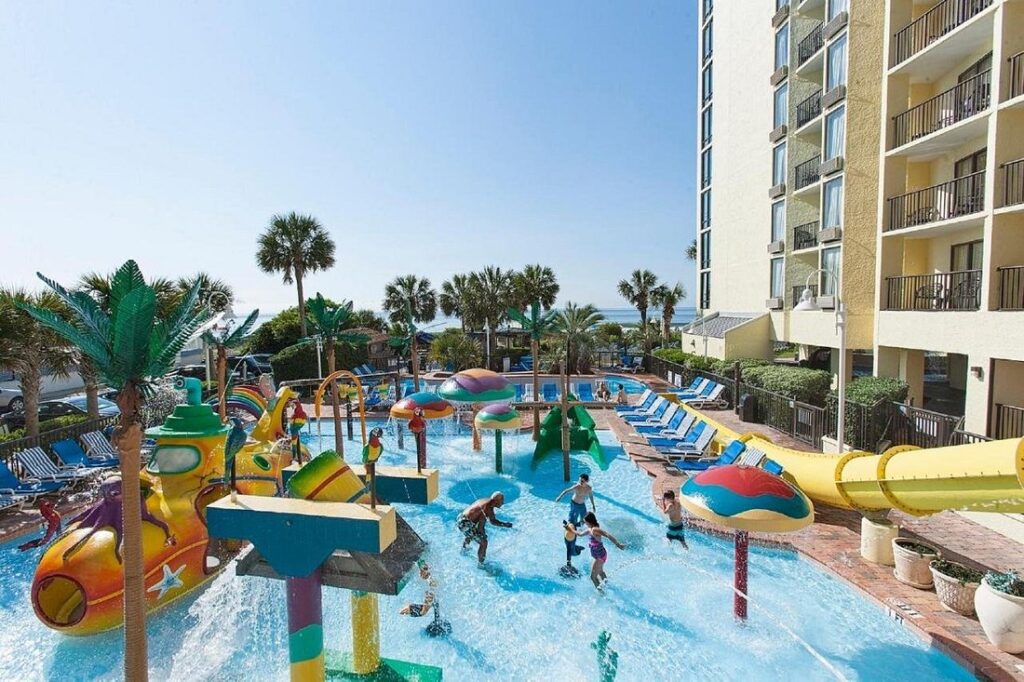 Sea Crest Oceanfront Resort with children playing in kids pool area