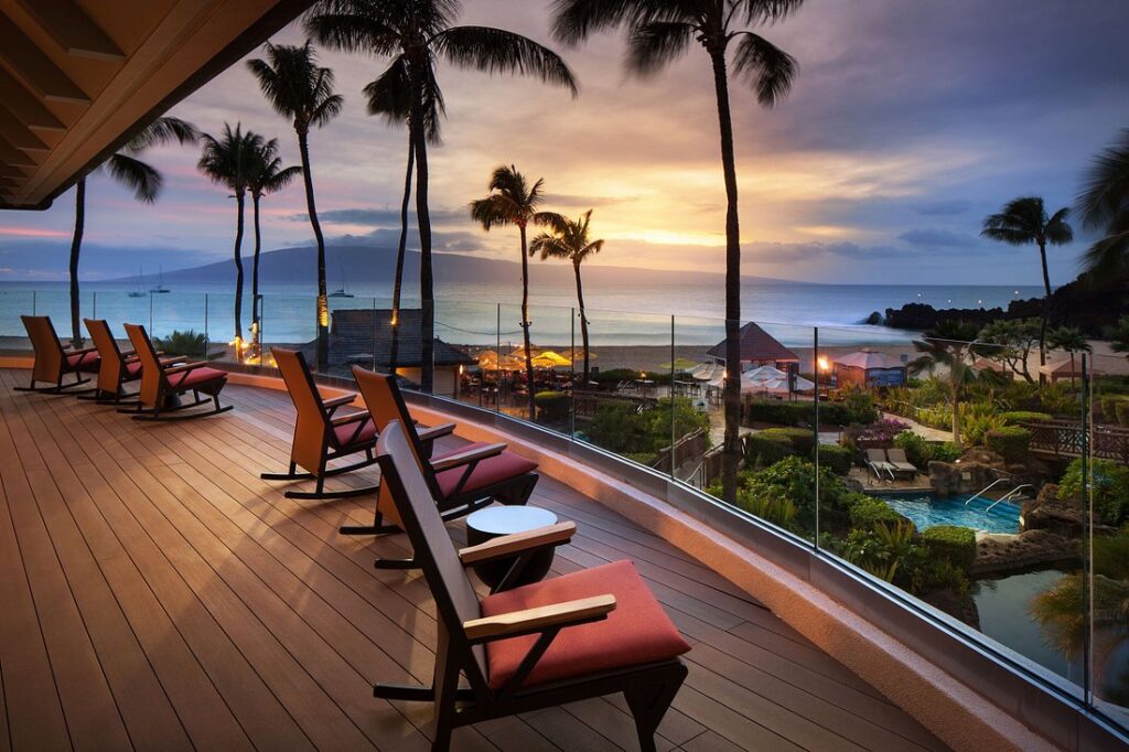 Sheraton Maui Resort & Spa patio overlooking ocean with palm trees