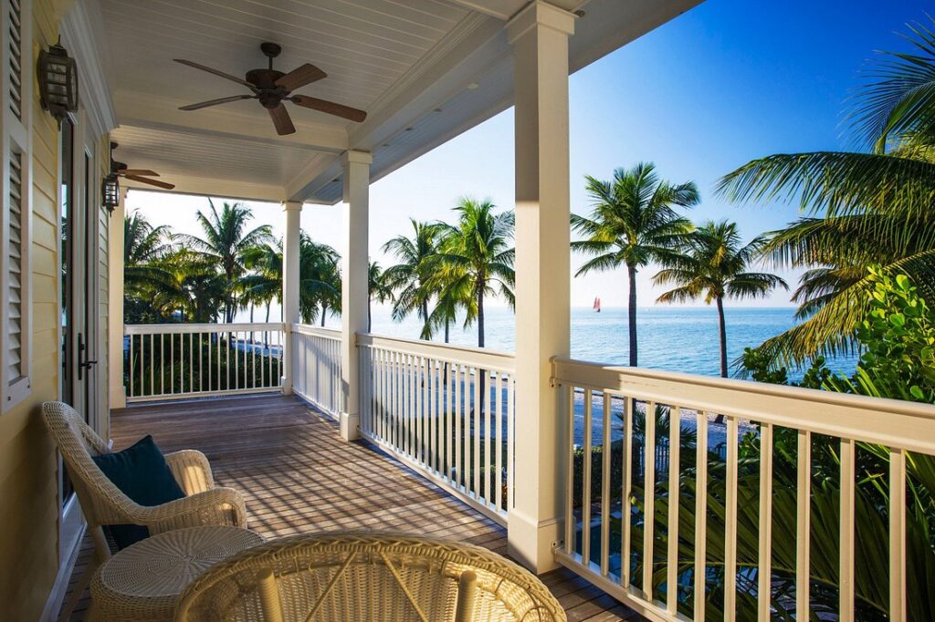 Sunset Key Cottages porch overlooking palm trees