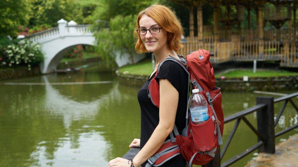 woman red backpack resized