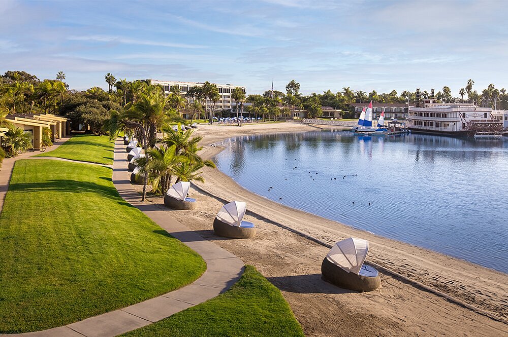 private covered lounge chairs along water
